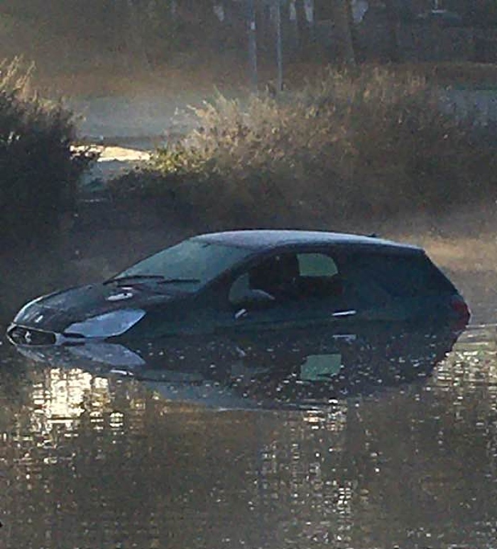 car in nantwich lake 2 - by Kath edwards