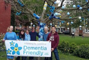 Volunteers turn Nantwich tree blue to mark Dementia Action Week