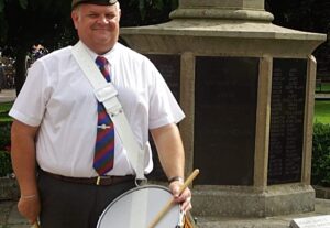 Wistaston drummer leads celebration of Victory in Japan Day