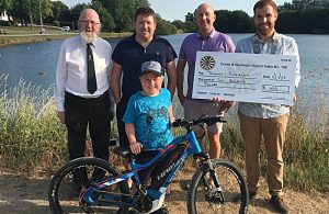 Crewe & Nantwich Round Table help fund youngster’s electric bike
