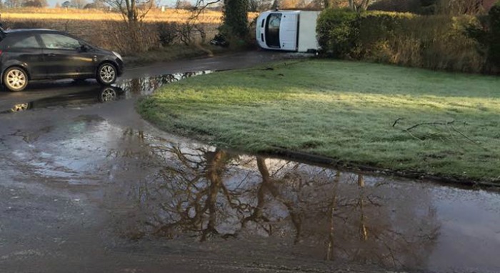 flooded junction of Eastern Road and Rope Hall Lane