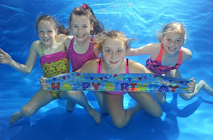girls celebrate water babies anniversary