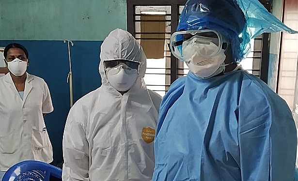 health staff wearing PPE - pic by Javed Anees under creative commons licence