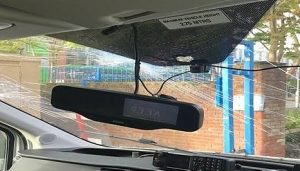 inside police car with smashed windscreen