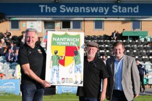 Nantwich artist Tony donates artwork to Nantwich Town FC