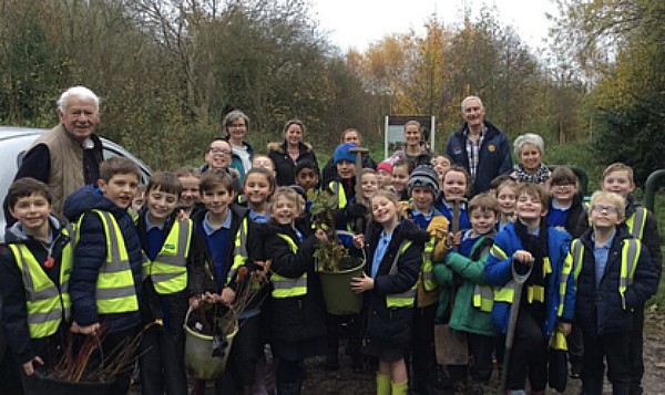 millfields pupils planting at coed wen