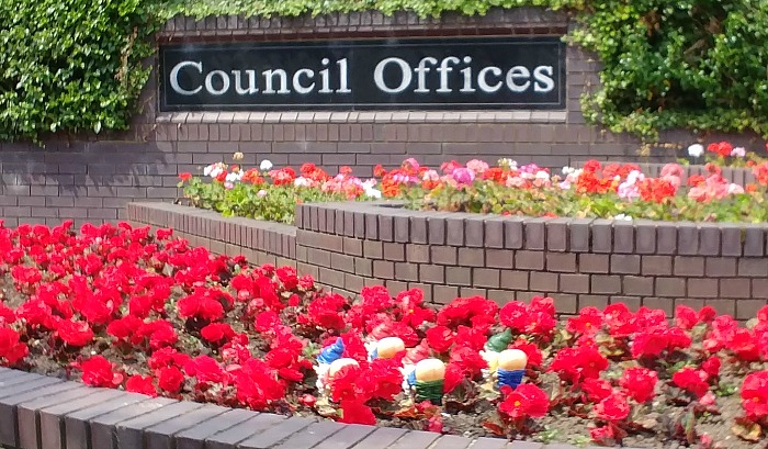 mooning gnomes outside council buildings