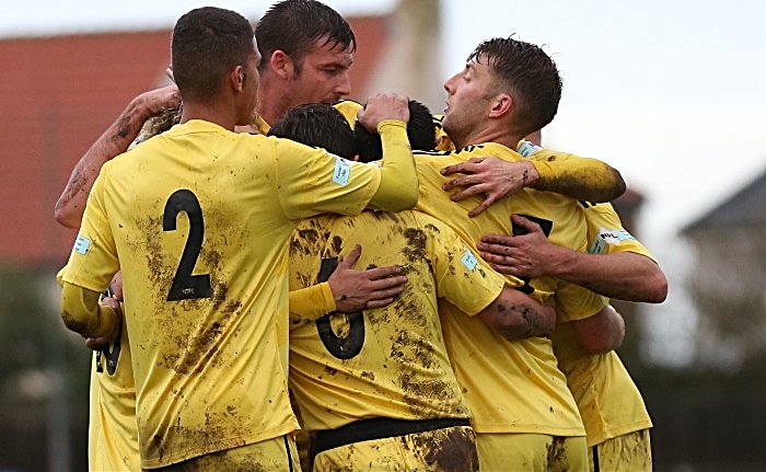 nantwich players celebrate goal against whitby