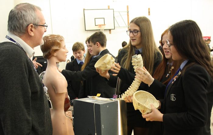 Careers - Sofia Fernandez Babkina, Katie Everett and Catherine Willis - 'hands on feel' of human skeleton with Matthew Williams from Cheshire College South and West