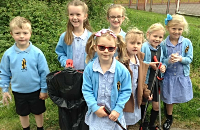 pear tree pupils picking litter