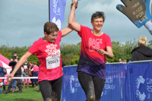 Reaseheath College turns pink at Cancer Research UK Pretty Muddy event