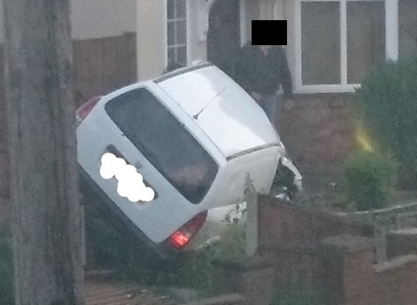 white van crashed into garden in millstone lane_censored